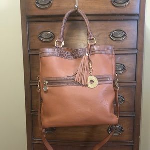 Leather handbag/tote In dark tan with snake pattern trim.